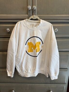 Men's White Crewneck Sweatshirt with Gold 'M' Graphic